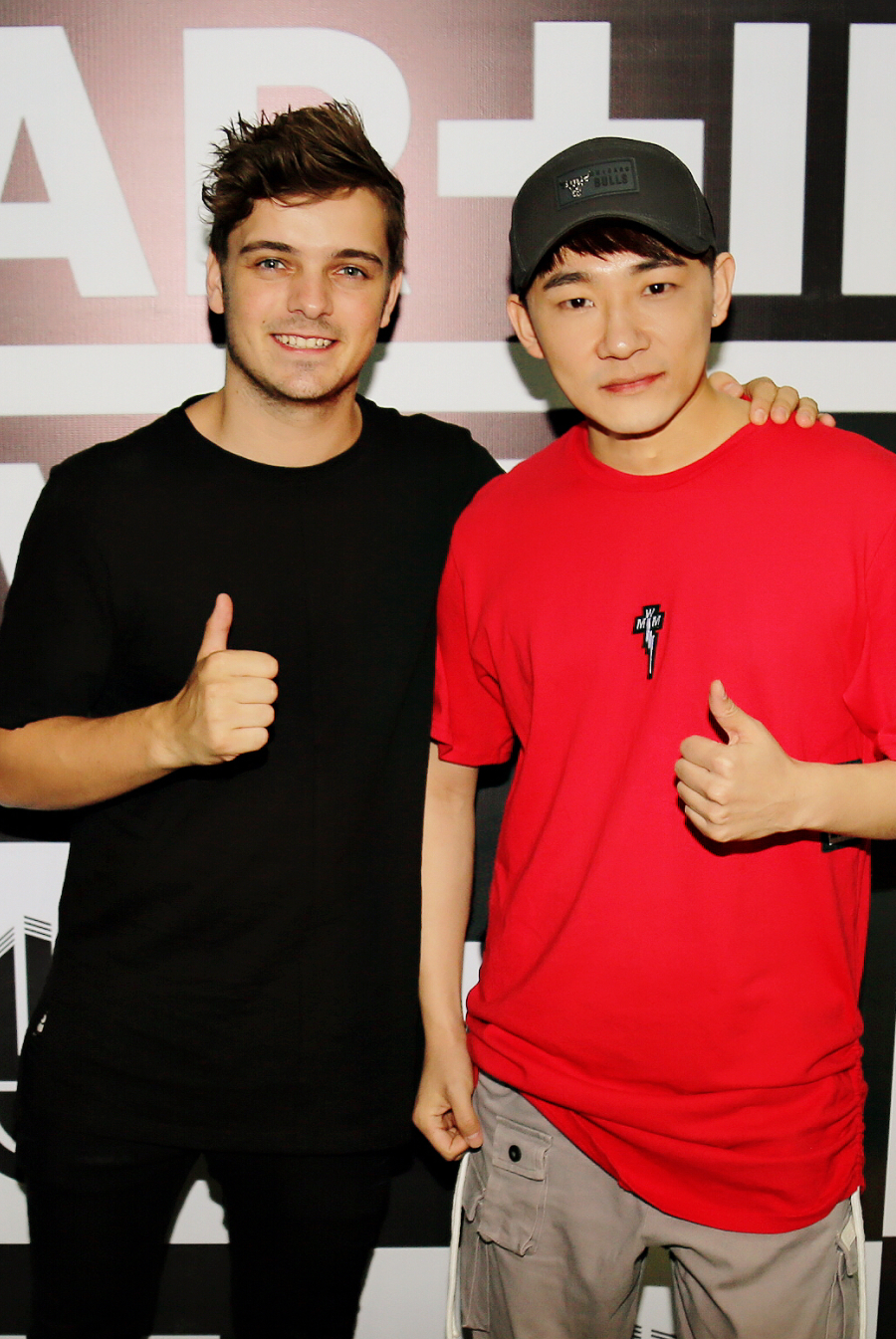 Martin Garrix with a fellow producer at an event